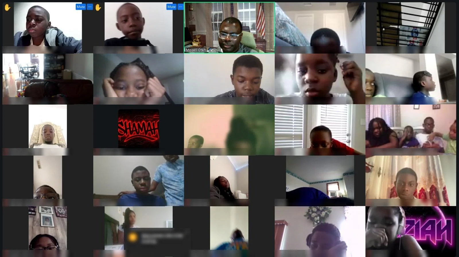 Moses Oteh leading an Online Bible Club on Zoom with children from many homes